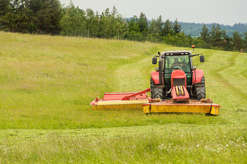 Tractor Mowing The Lawn Care Solution for Commercial Property